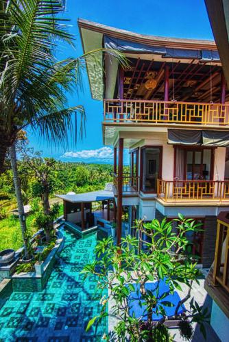 Bodhi Leaf East Wing. Top floor yoga sanctuary, guest rooms, pool, and swim-up pool bar